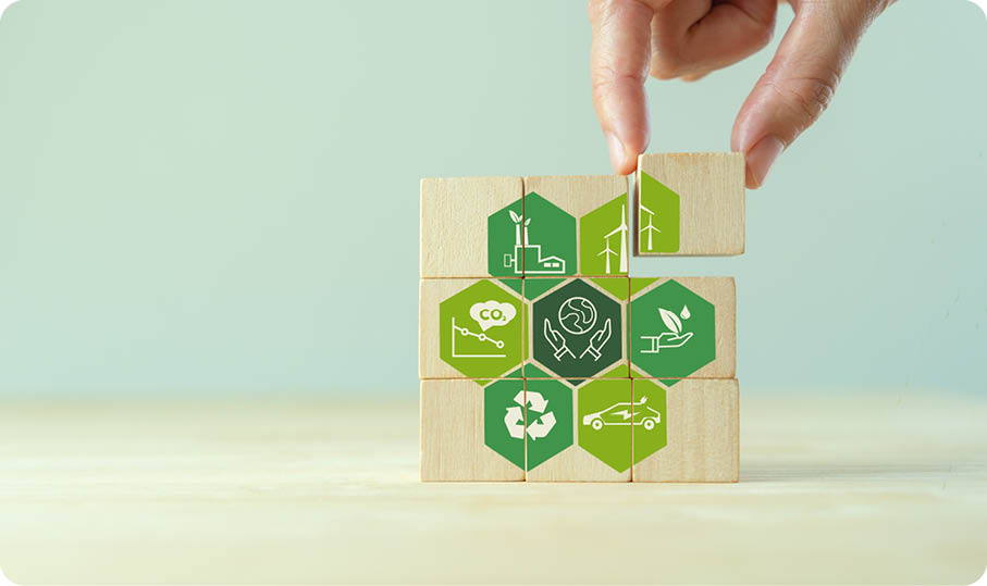 Save of earth, saving environment, net zero emissions concept  Green business and sustainable development  World earth day  Hand puts wooden cubes with clean energy icon standing on eco friendly icon 