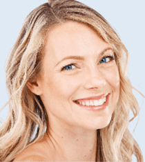 Beauty, hair and blonde model portrait with happiness for natural, clean and wavy texture cosmetic. Health, happy and beautiful woman with luxury hairstyle treatment in gray studio with smile